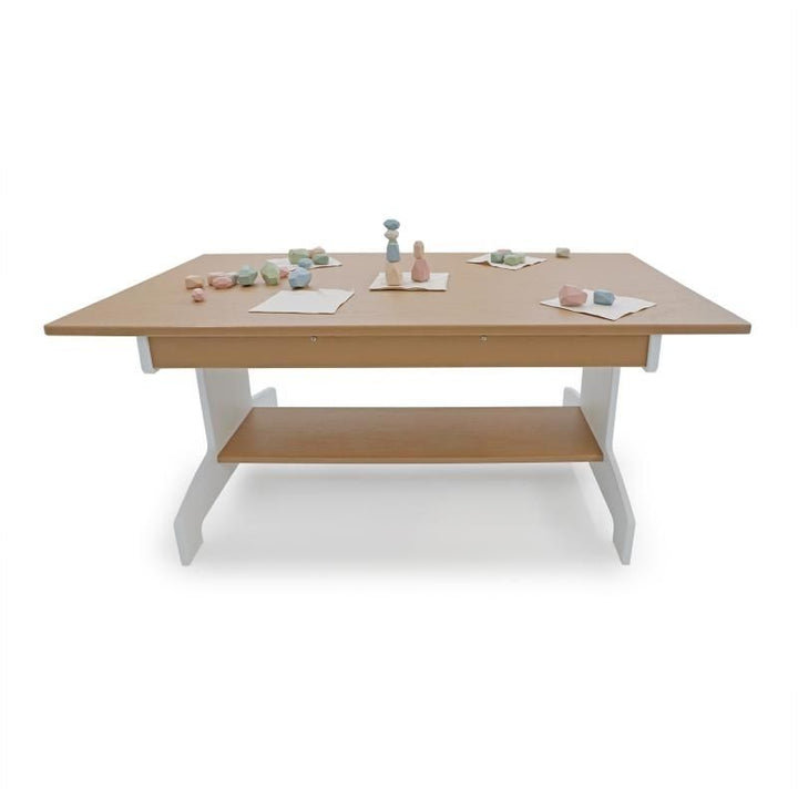 Whitney Brothers outdoorED Classroom Table landscape view with learning materials and toys on surface, showing outdoor classroom table in active preschool use