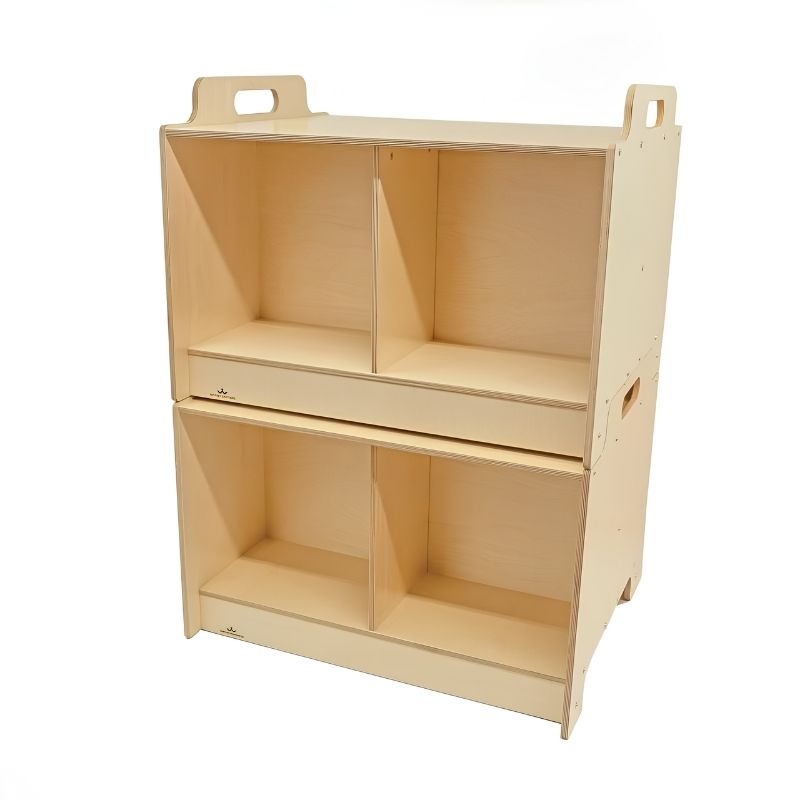 Two Whitney Brothers Stack-Able Tables stacked and interlocked to form a two-sided four-compartment storage cabinet for flexible early learning classrooms