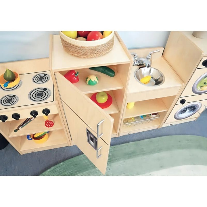 Top-down view of the Whitney Brothers Let's Play Toddler Kitchen Ensemble Natural showing the birch plywood appliance tops and the open shelf storage design of the stove and sink cabinets